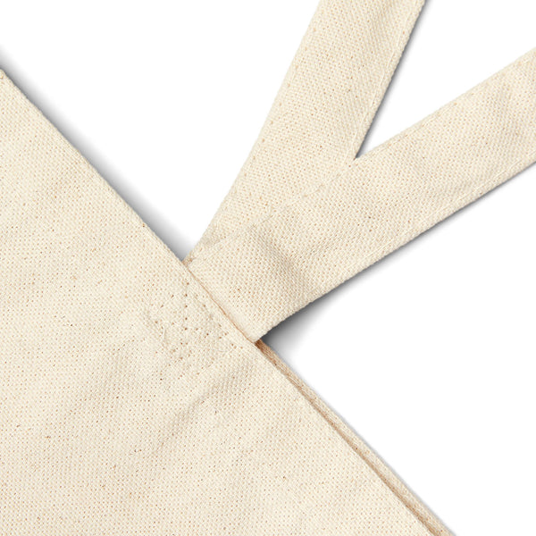 Close up of the natural 12 oz cotton canvas and the handle seam