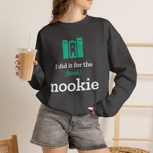 Woman wearing the dark heather grey Nook & Things bookish crewneck sweatshirt