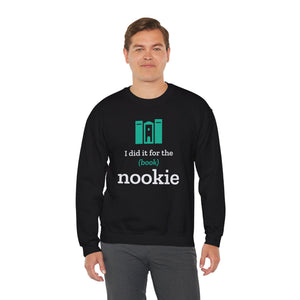 Man wearing the black Nook & Things crewneck sweatshirt, front view
