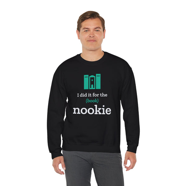 Man wearing the black Nook & Things crewneck sweatshirt, front view