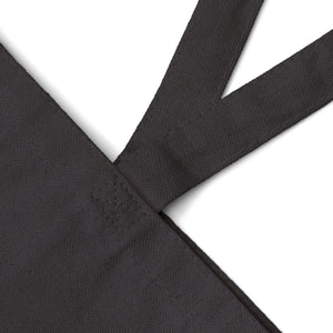 Close up of the black 12 oz cotton canvas and the handle seam