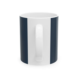Navy Nook & Things bookish mug seen from behind, white handle