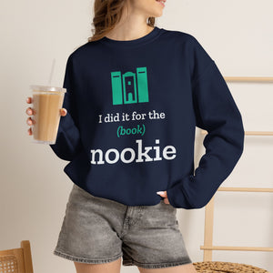 Woman wearing the navy Nook & Things bookish crewneck sweatshirt with an iced coffee