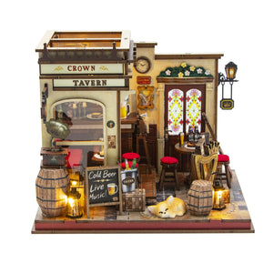 Nook & Things Crown Tavern DIY miniature kit, front view on white, lights on