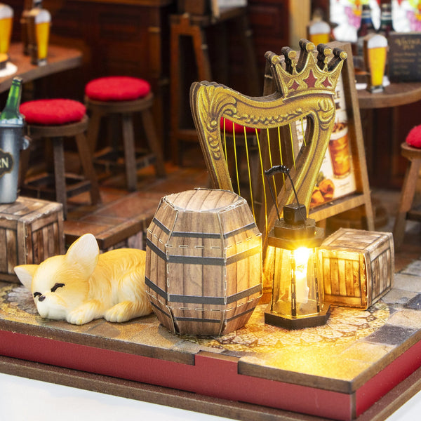 Nook & Things Crown Tavern DIY miniature kit, close-up of the golden harp and barrel