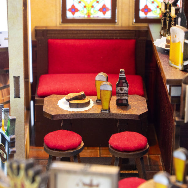 Nook & Things Crown Tavern DIY miniature kit, close-up of the red booth