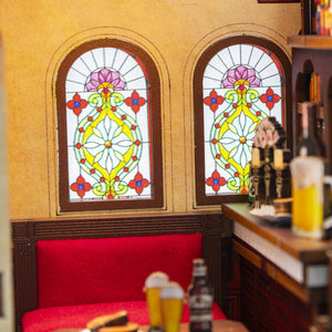 Nook & Things Crown Tavern DIY miniature kit, close-up of the stained glass windows