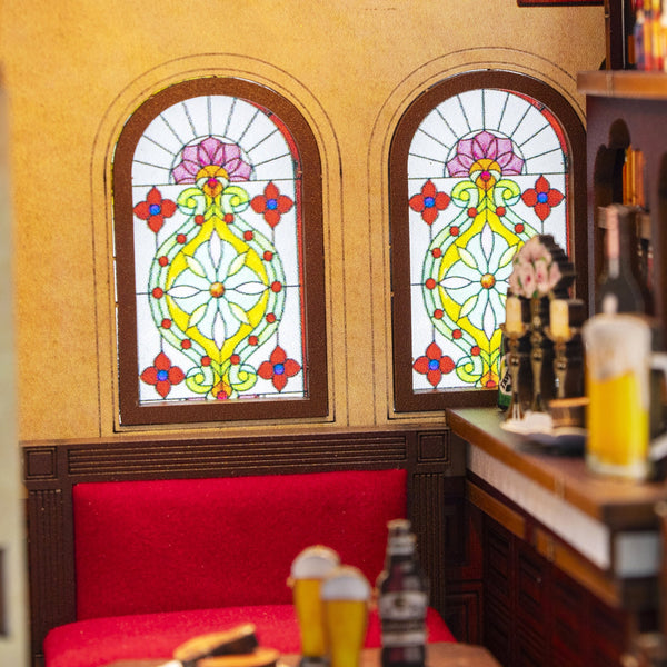 Nook & Things Crown Tavern DIY miniature kit, close-up of the stained glass windows