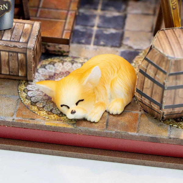 Nook & Things Crown Tavern DIY miniature kit, close-up of the sleeping dog