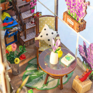 Nook & Things Garden House DIY book nook kit, close-up of the rocking chair and side table