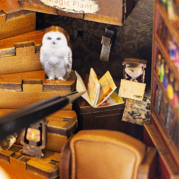 Nook & Things Magic Coffee House DIY book nook kit, close-up of the owl on the stairs