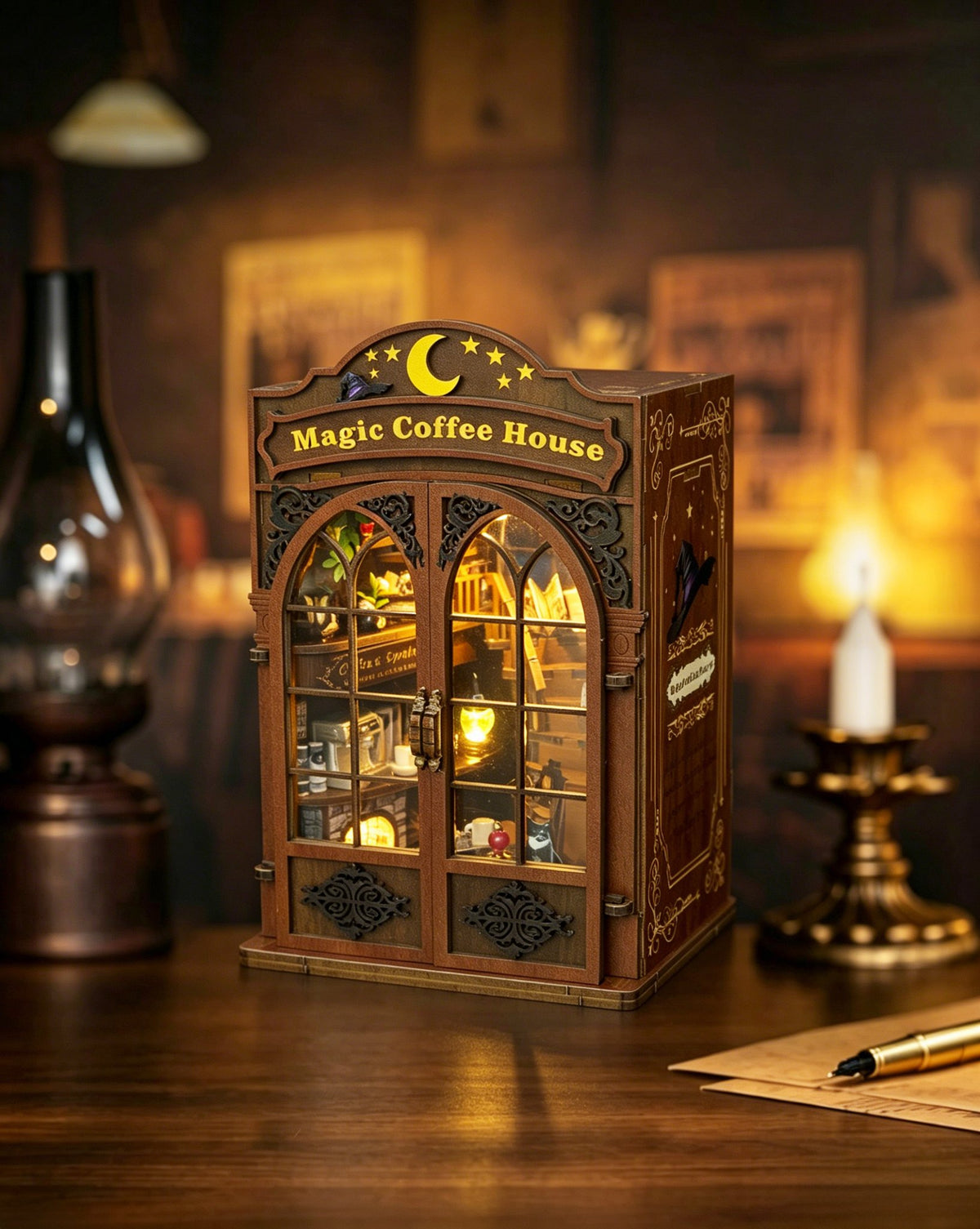 Nook & Things Magic Coffee House book nook beside a lantern