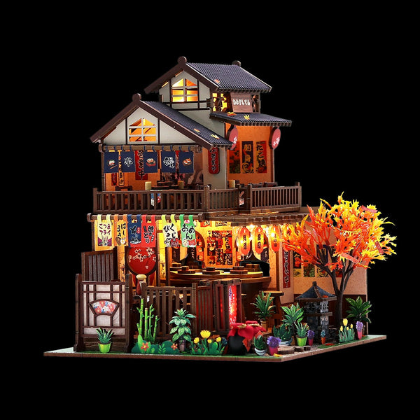 Nook & Things Wawei Sushi House DIY miniature kit, lit up on a dark background