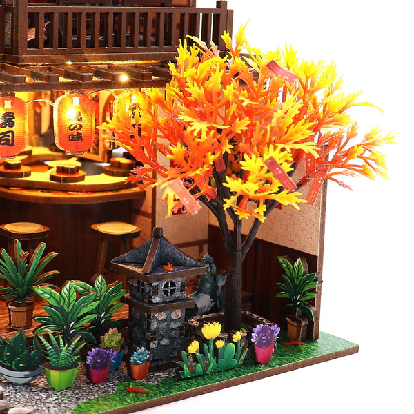 Nook & Things Wawei Sushi House DIY miniature kit, close-up of the maple tree and stone lantern
