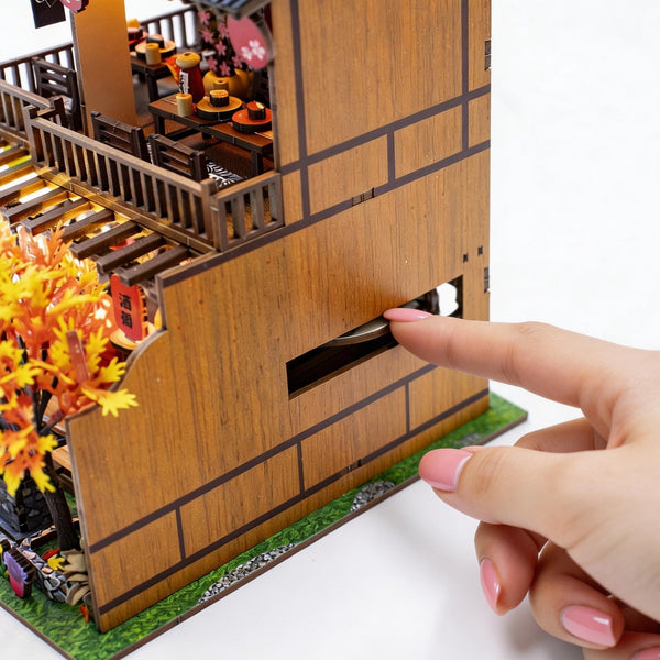 Nook & Things Wawei Sushi House DIY miniature kit, the side lever that turns the sushi conveyor