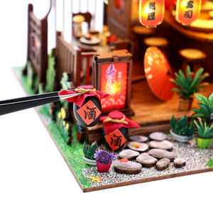 Nook & Things Wawei Sushi House DIY miniature kit, placing a piece with tweezers